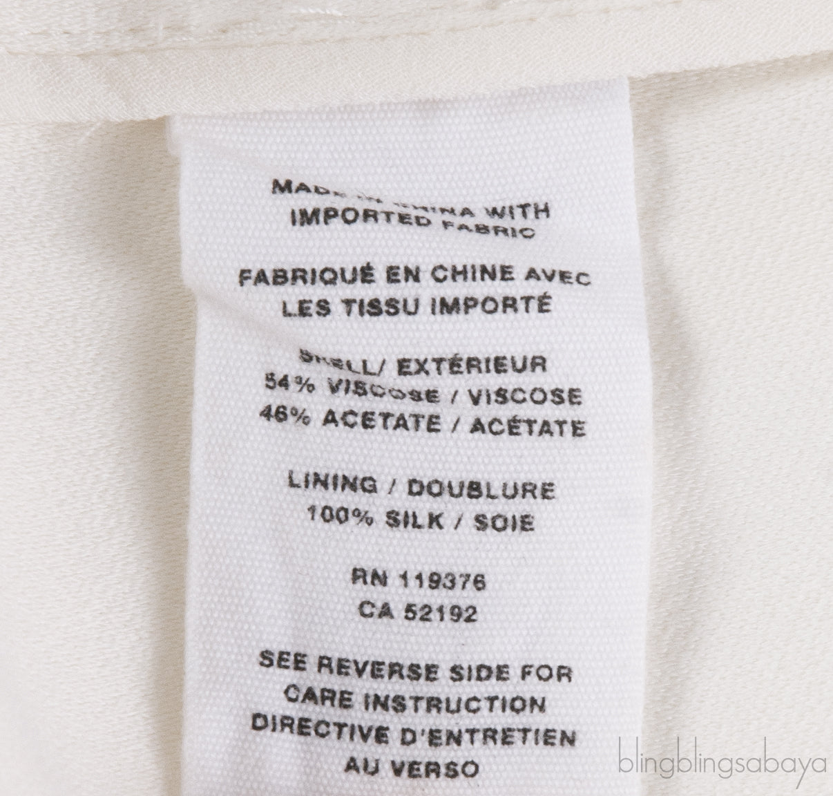 Asymmetric Shoulder Off-white Top