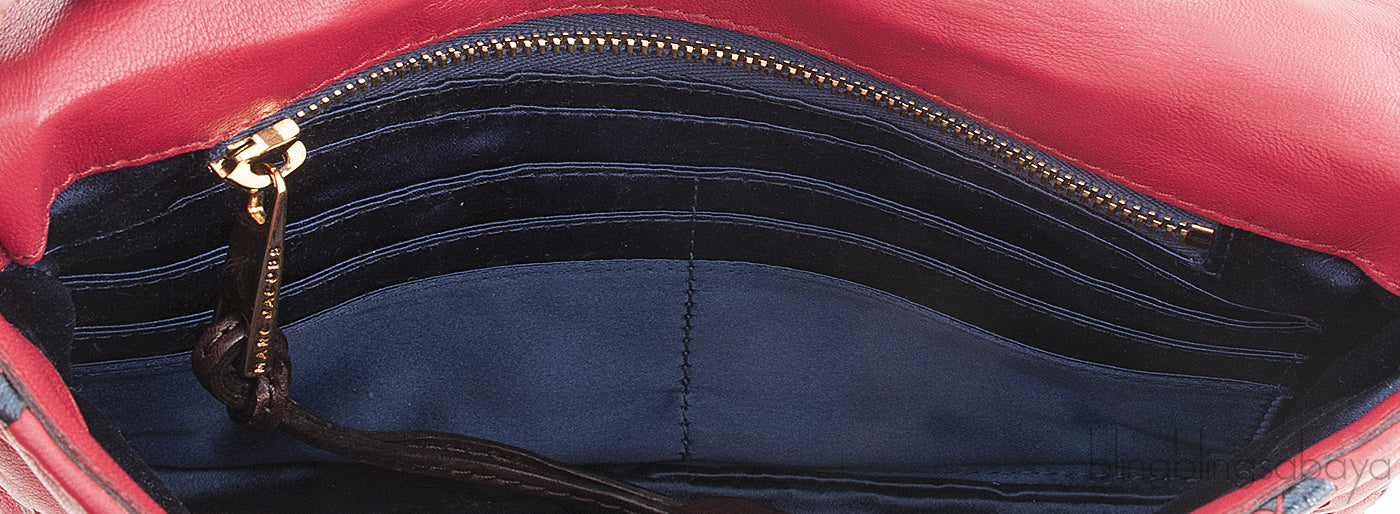 Quilted Leather Tassel Padlock Clutch