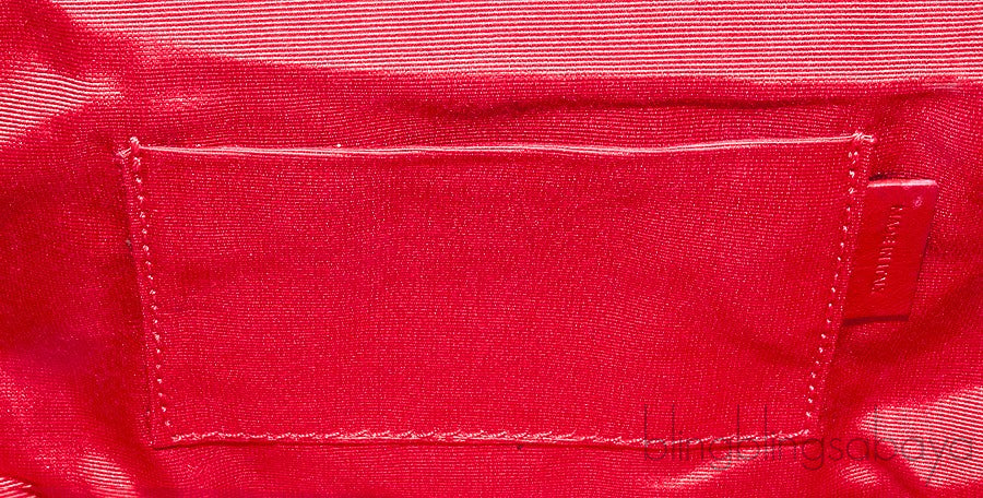 Python Loubi Clutch Bag