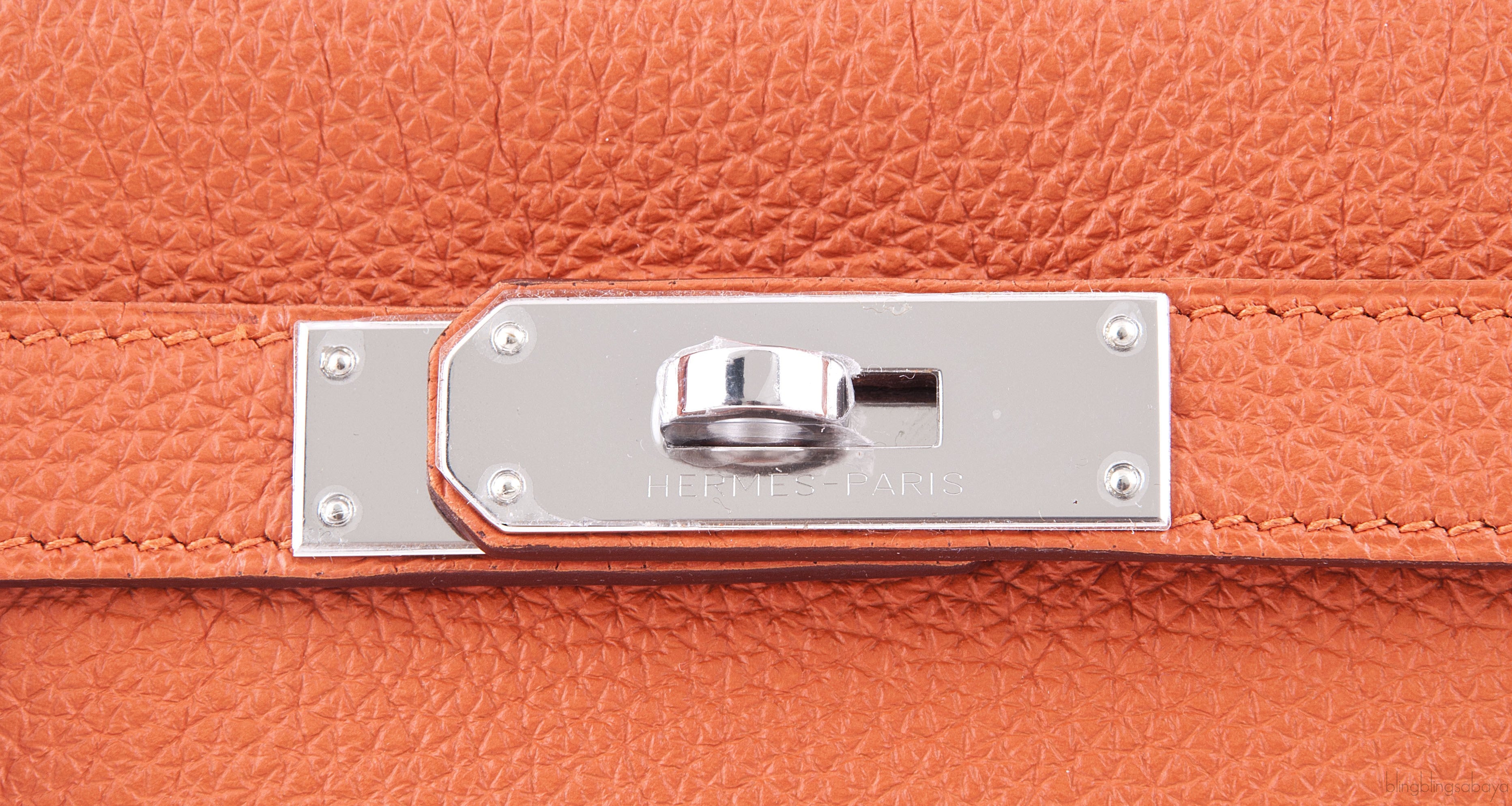 Kelly 32 Orange Togo Retourne