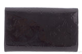 Ana Vernis Monogram Chain Clutch