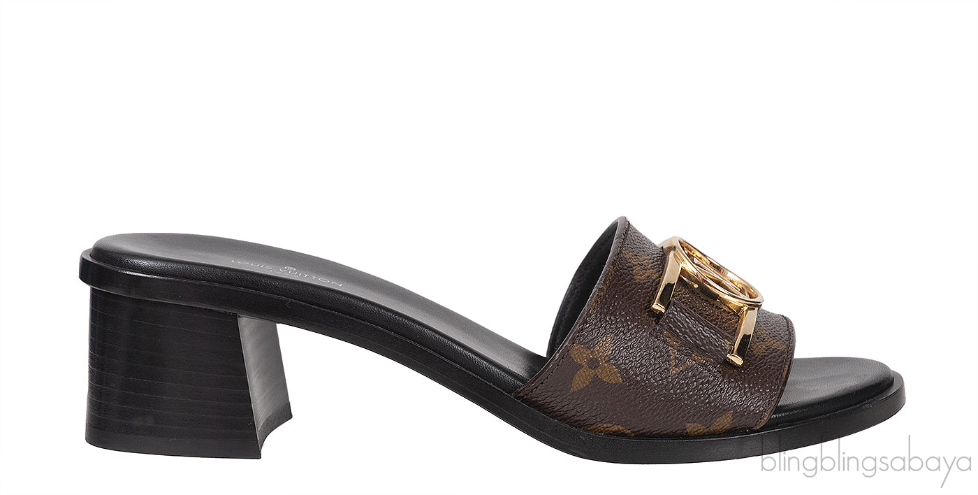 Louis Vuitton Monogram Lock-it Block Mules