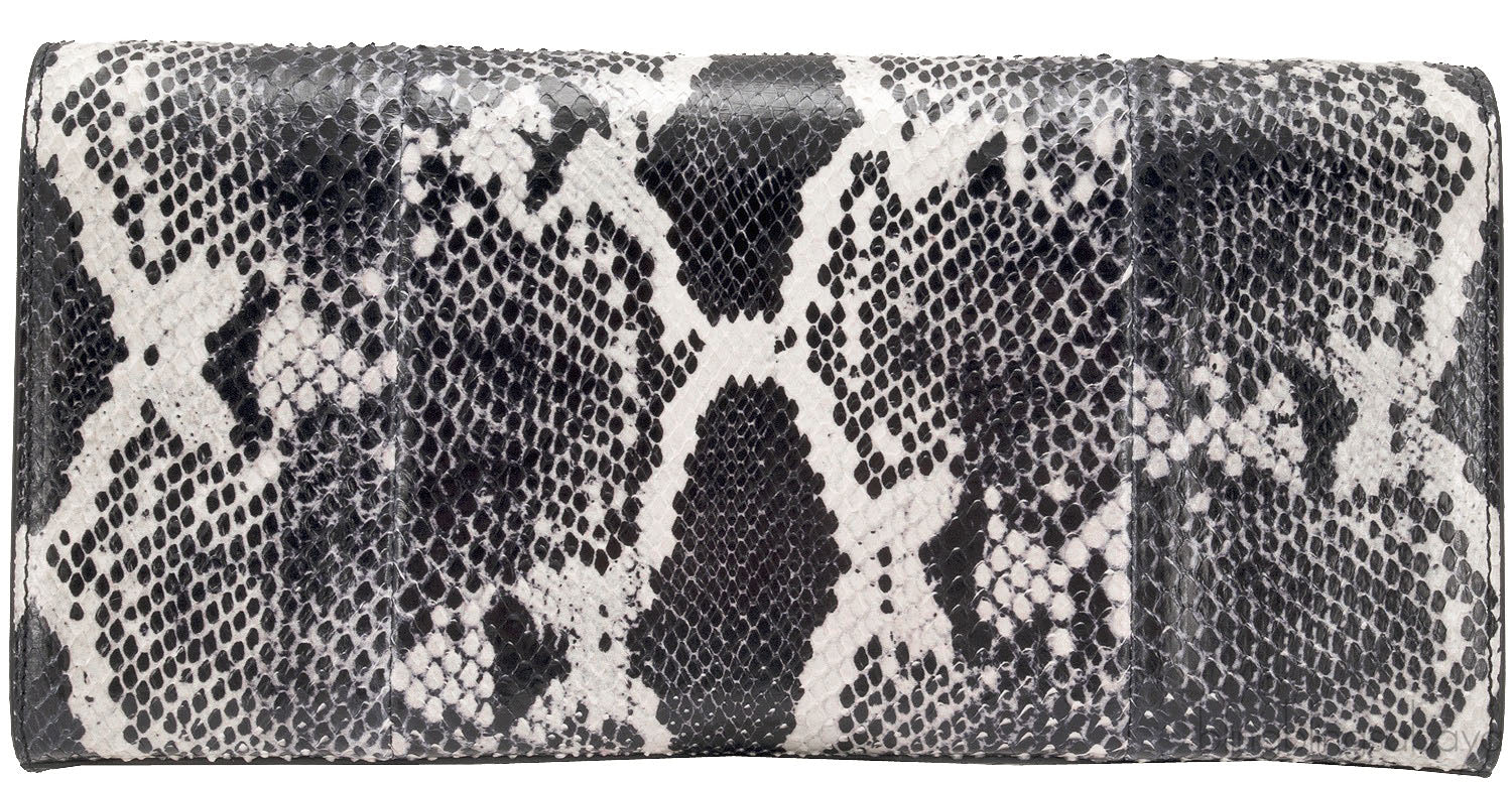 Casandra Monogram Tassle Clutch