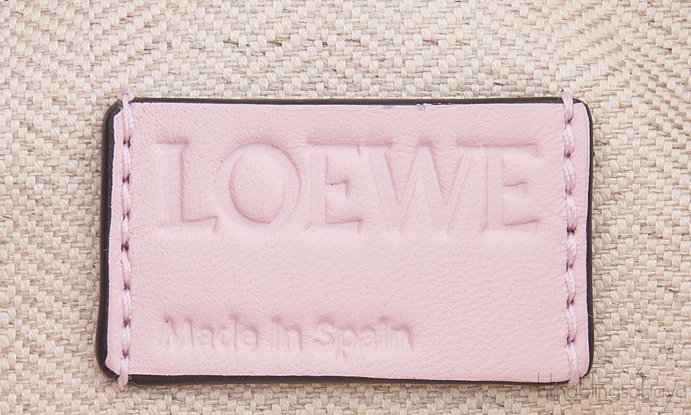 Pink Logo Embossed Clutch