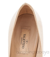 Bow Nude Patent Pump