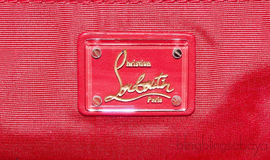 Python Loubi Clutch Bag