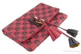 Quilted Leather Tassel Padlock Clutch