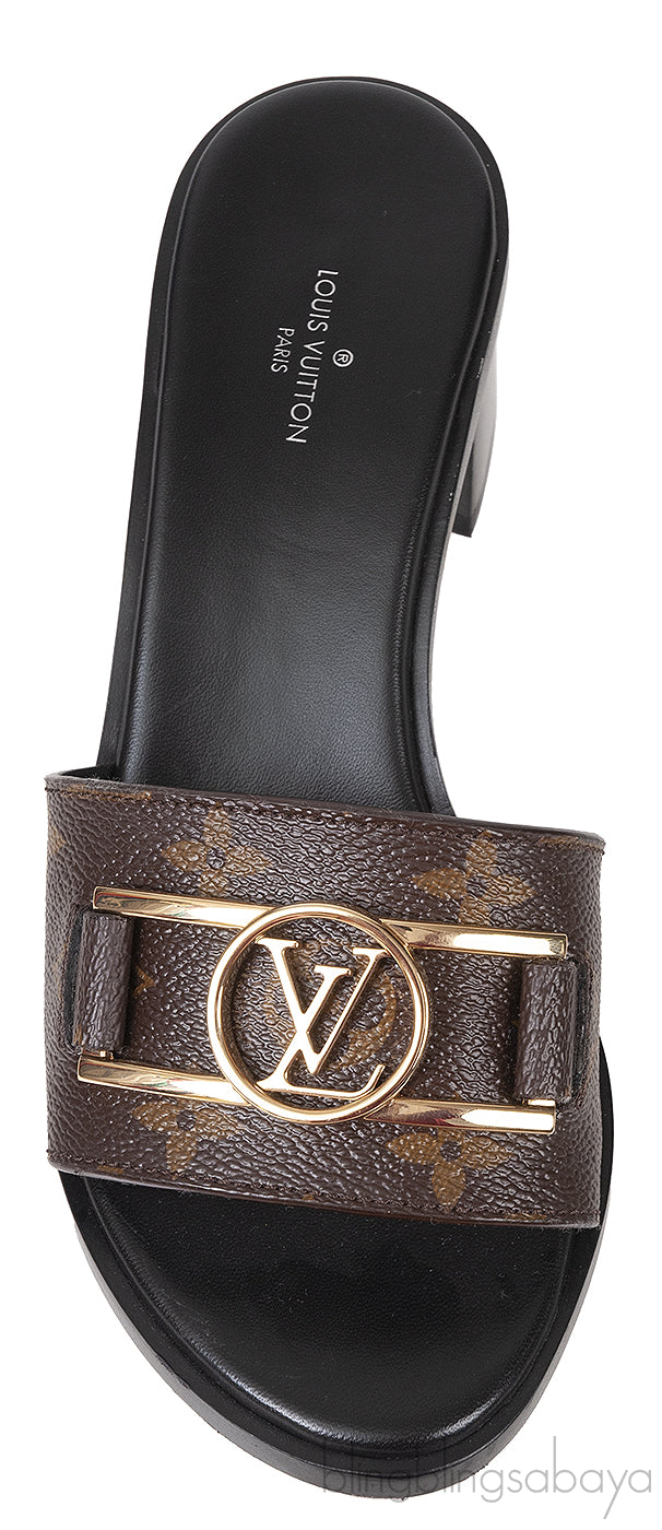 Louis Vuitton Monogram Lock-it Block Mules