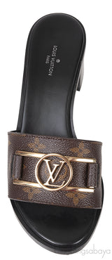 Louis Vuitton Monogram Lock-it Block Mules
