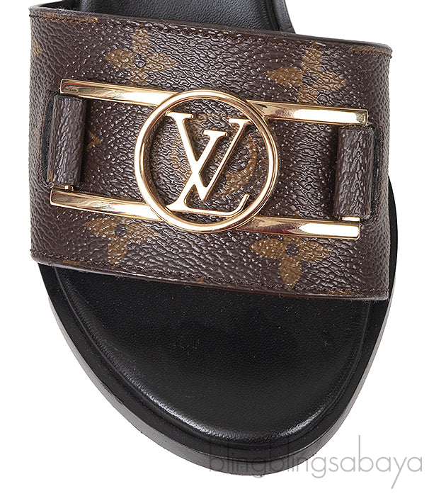 Louis Vuitton Monogram Lock-it Block Mules