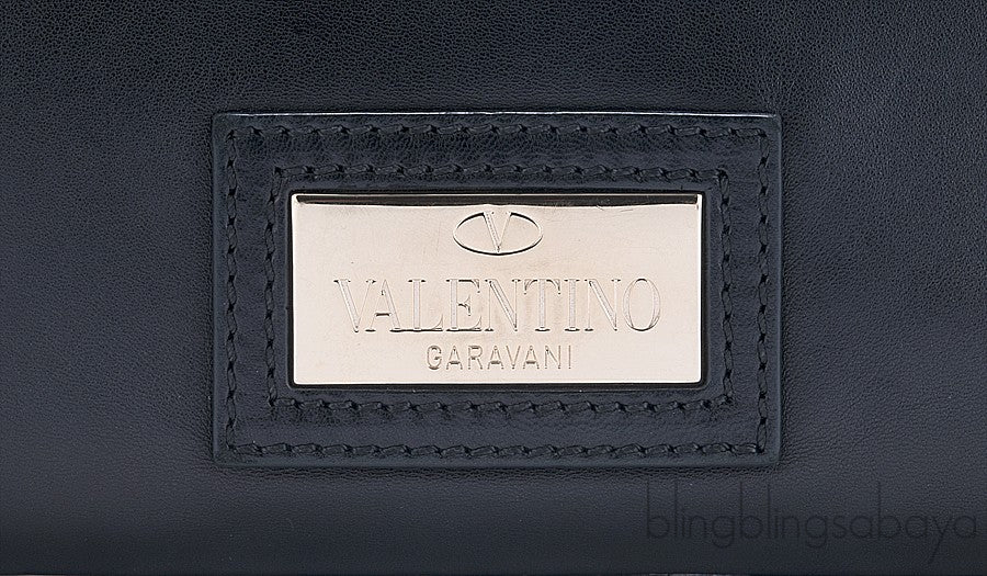 Rosette-appliquéd Leather Clutch