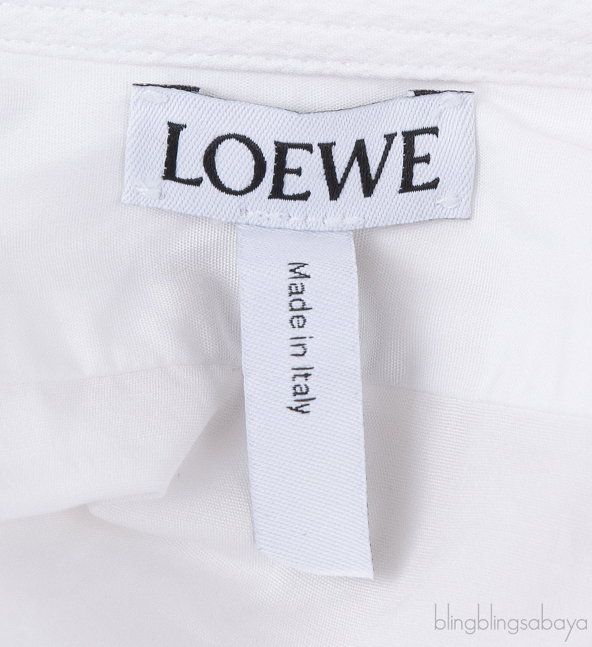 White Long Back Assymetric Shirt and Pink Wide Leg Trouser