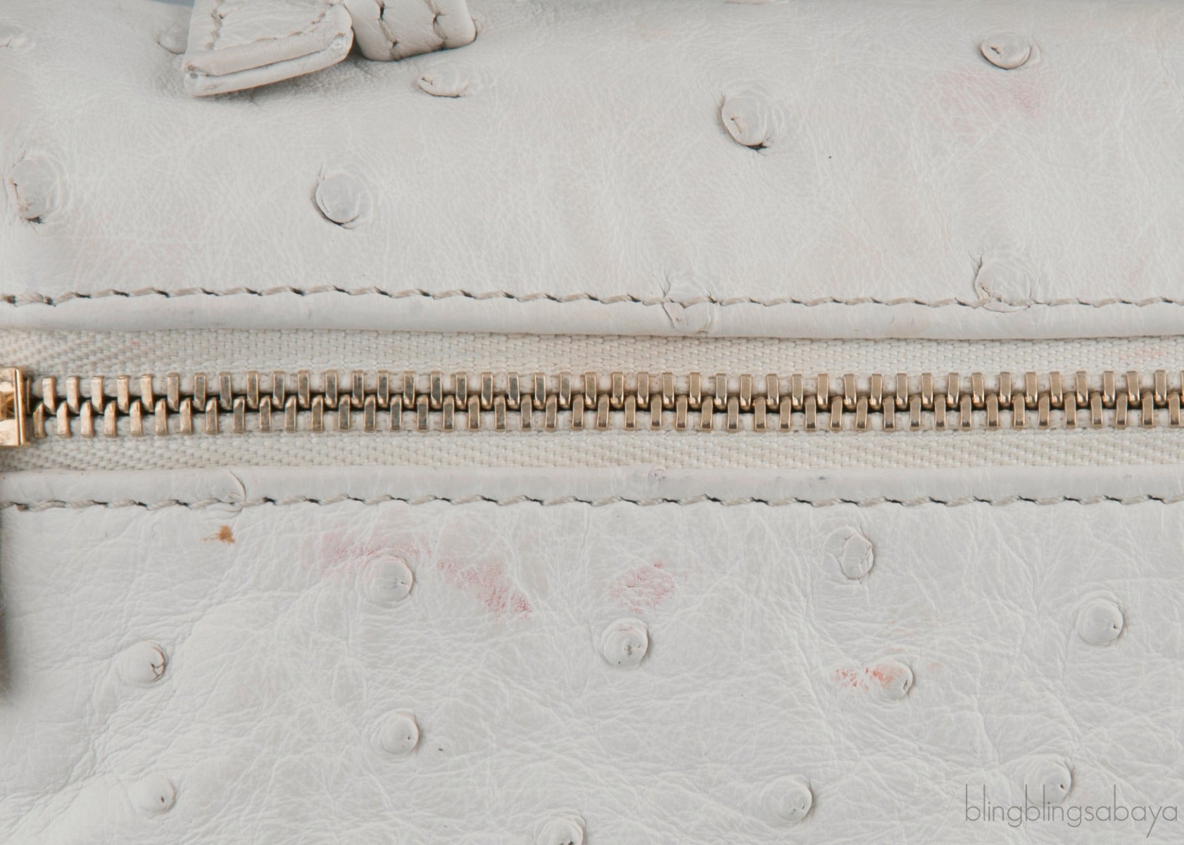 L19 White Ostrich Pouch