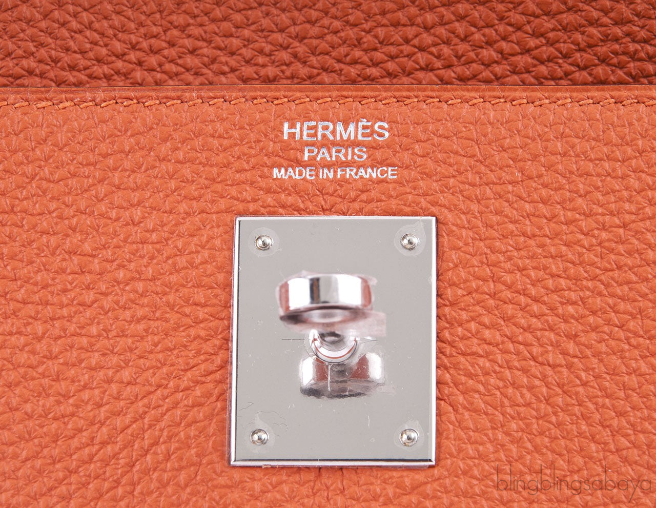 Kelly 32 Orange Togo Retourne