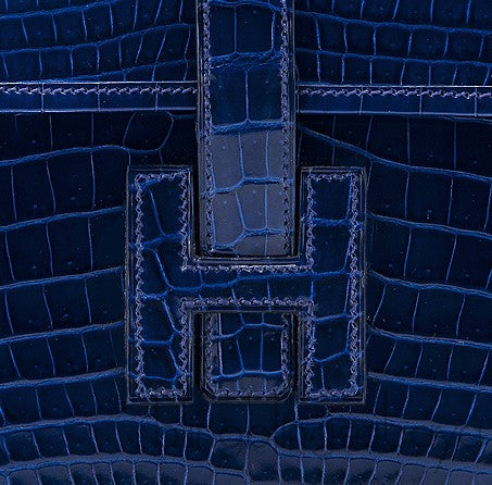 Jige Clutch Blue Niloticus