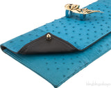 Maison Du Posh Ostrich Knuckle Ring Clutch