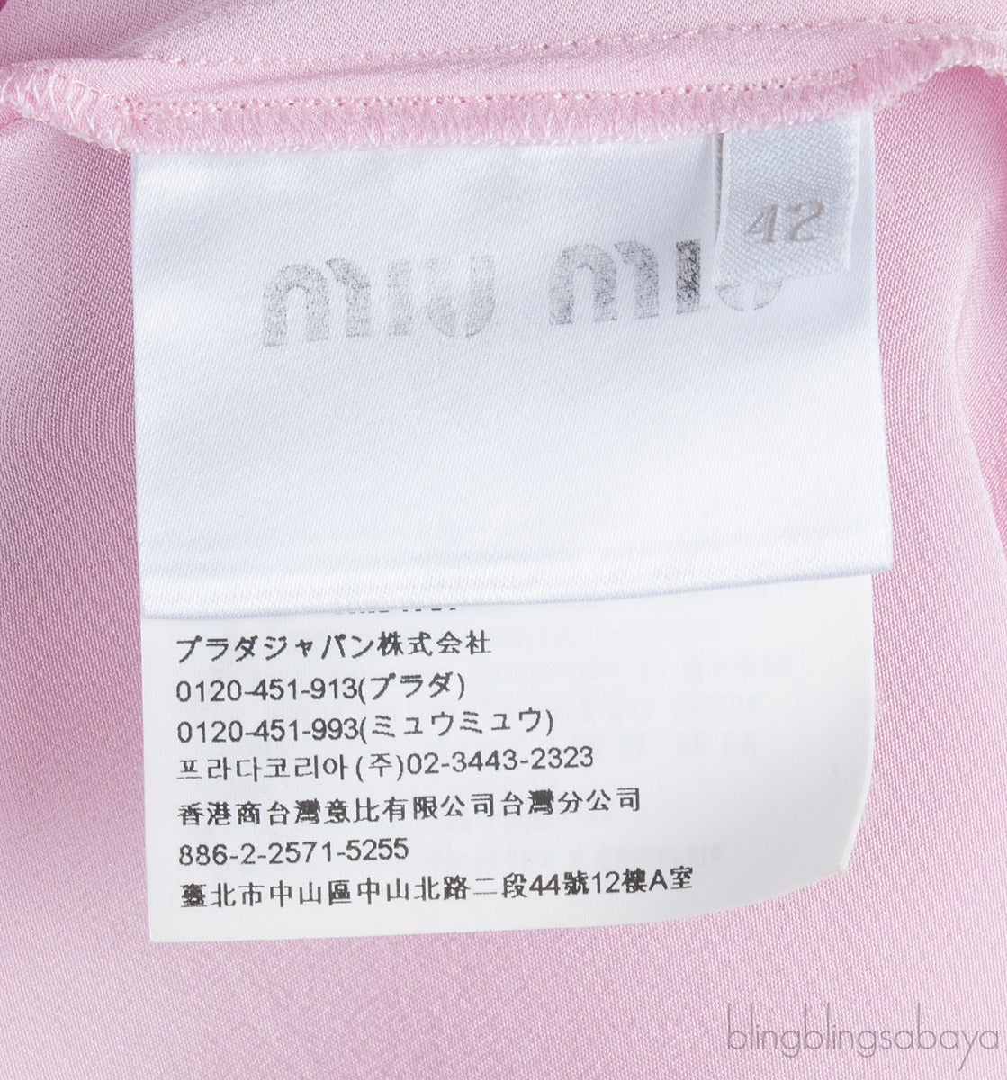 Pink Sleeveless Blouse